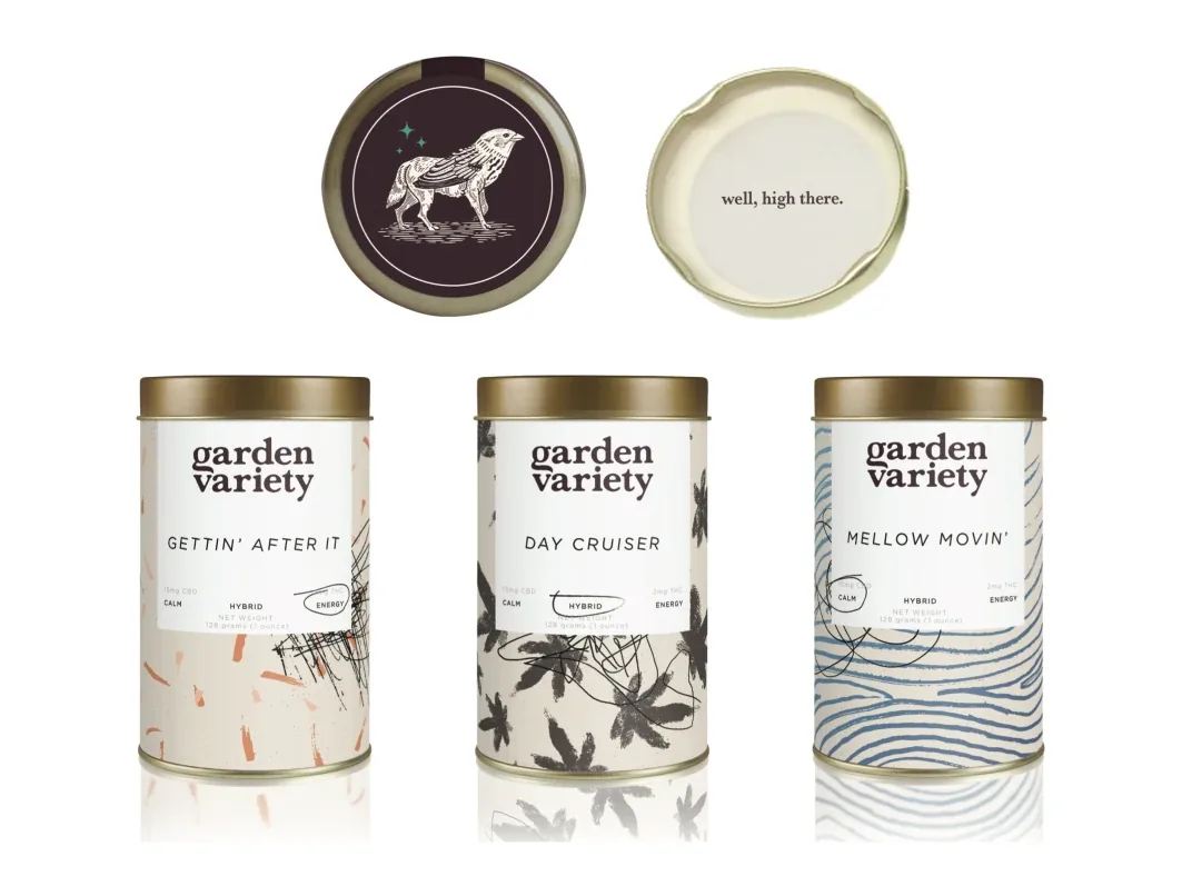 A packaging concept: three cream tins, each with the wordmark and a different botanical pattern, their lids above