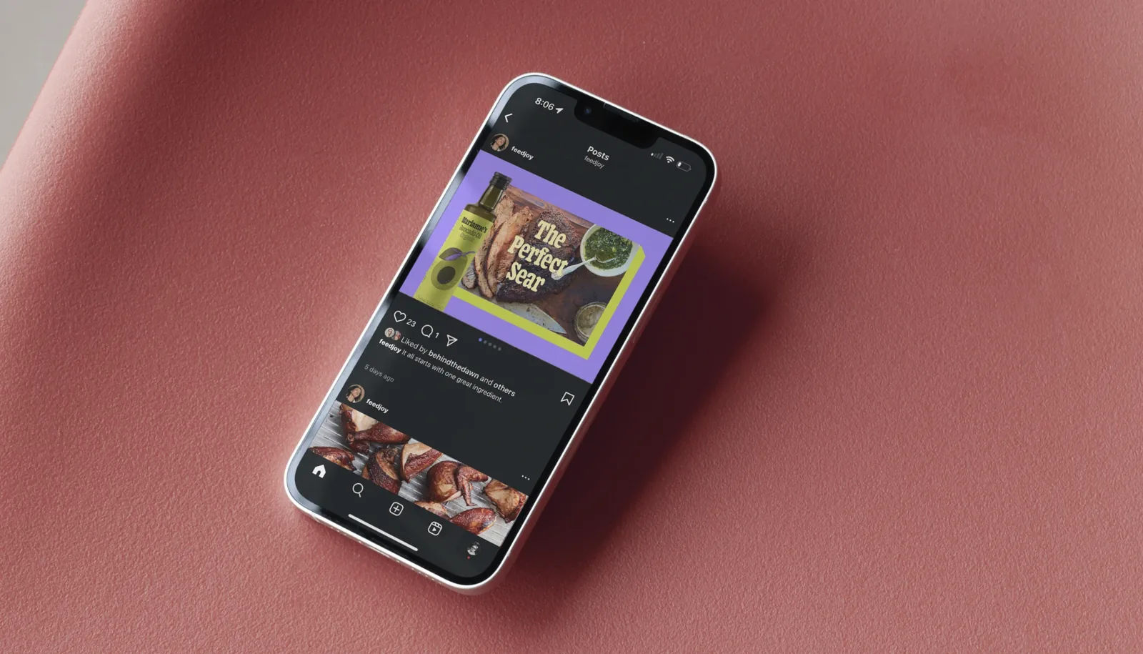 A phone on a pink chair showing The Perfect Sear post