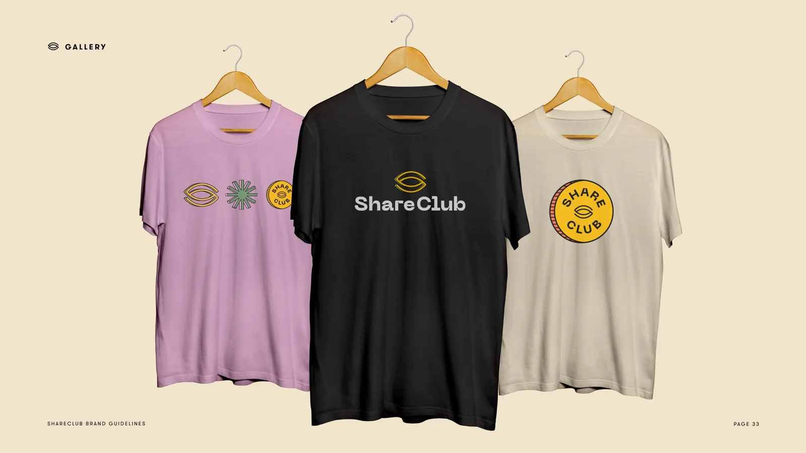 Three tees on hangers: lilac with the eye mark, black with the ShareClub wordmark, cream with the club badge